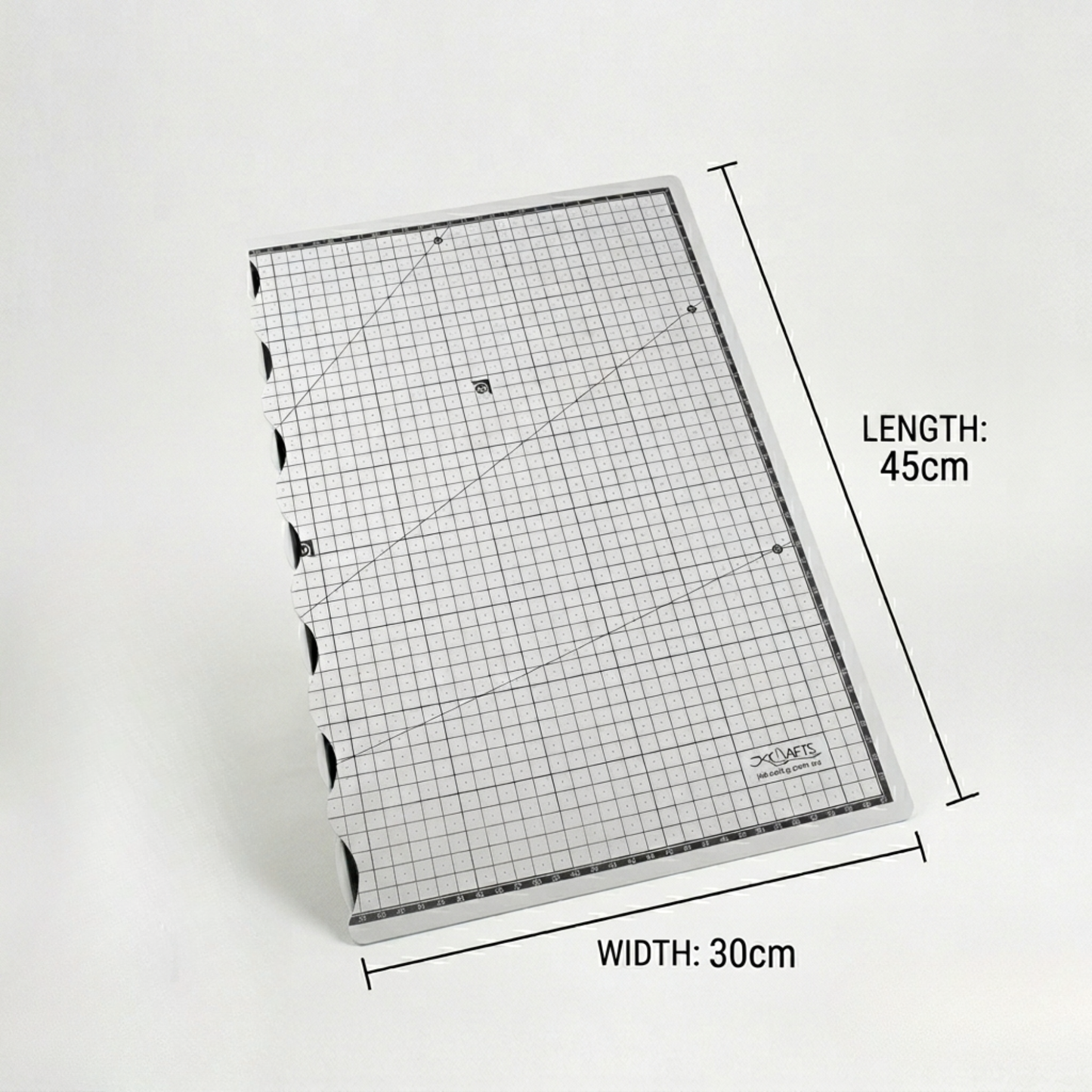 Lightweight foldaway A2 travel quilting mat showcasing exact width and height proportions for compact desks.