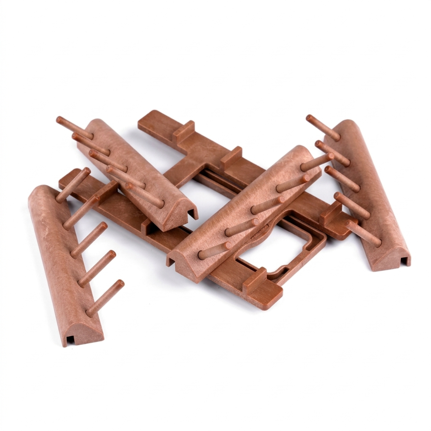 Disassembled components of a modular wooden thread organizer rack showing the individual peg tiers and side bars.