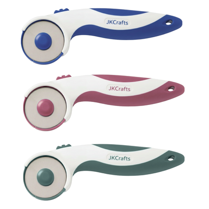 Three ergonomic soft cushion grip fabric rotary cutters displayed vertically in blue, maroon, and green handles.