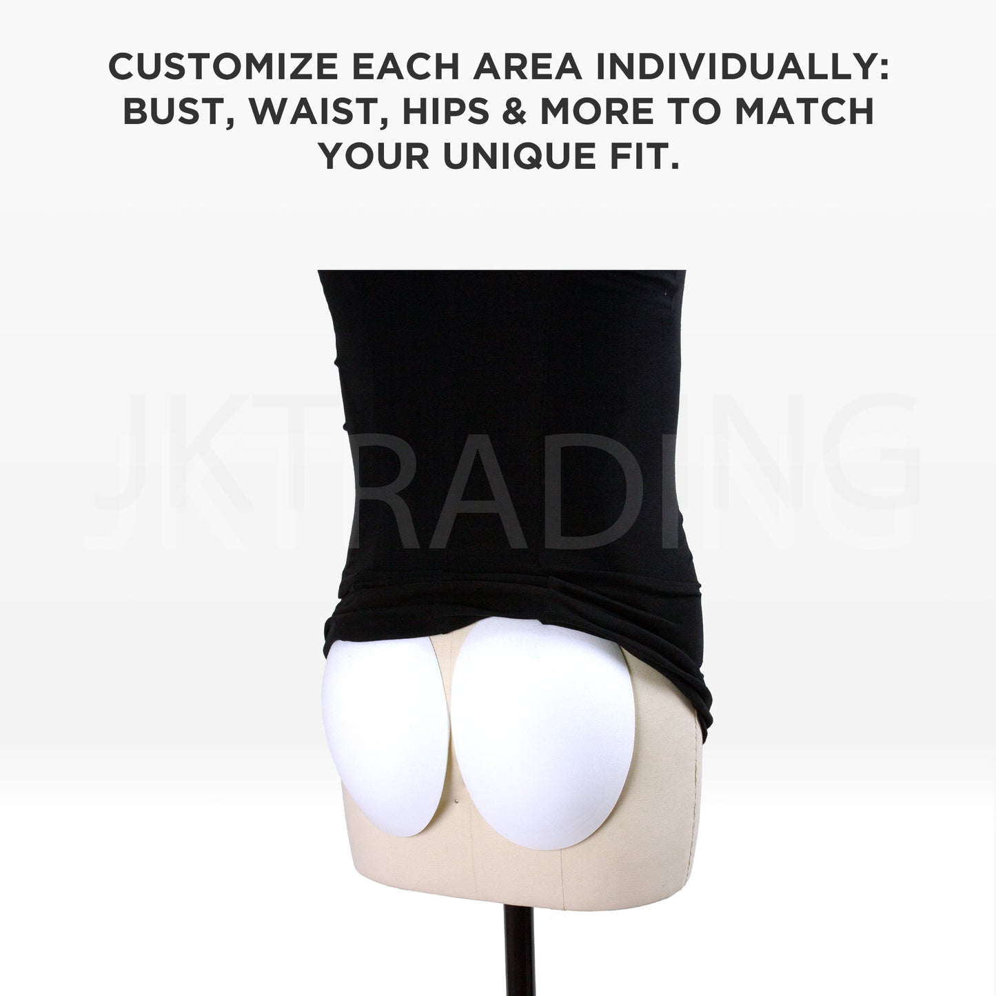 Black stretch fabric body sleeve smoothing out hip and buttock padding pieces on a dress form.