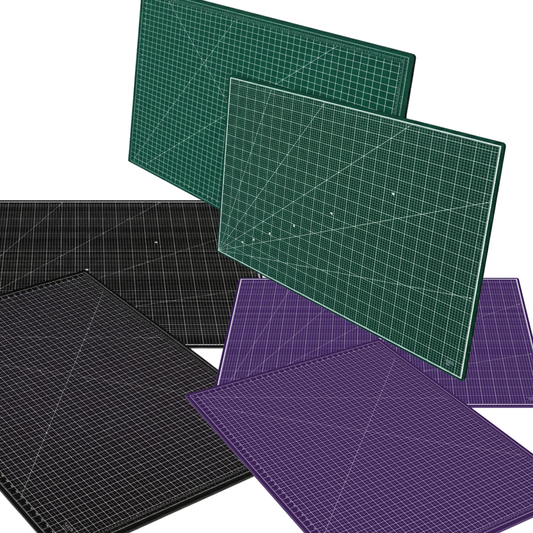 Color selection stack showcasing the extra large A0 self-healing cutting mat options in classic green, sleek black, and deep purple.
