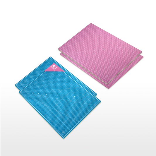 A1 size double-sided self-healing PVC cutting mats in vibrant blue and pink colors for crafts, quilting, and sewing projects.