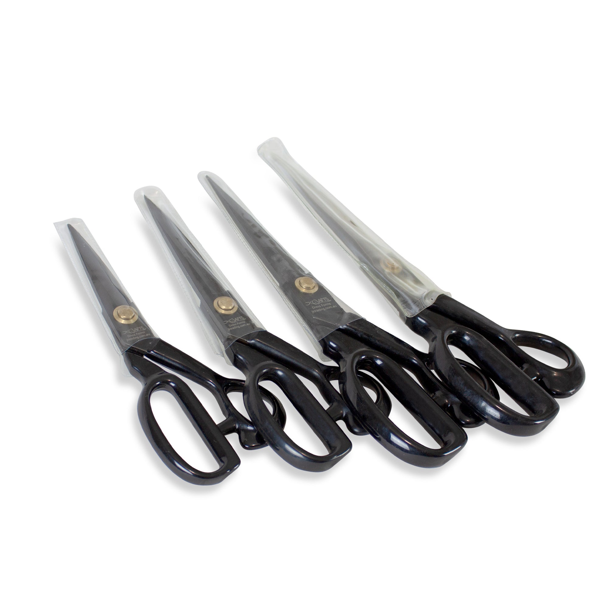 Set of four pairs of black-handled scissors on a white background