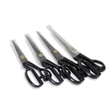 Set of four pairs of black-handled scissors on a white background