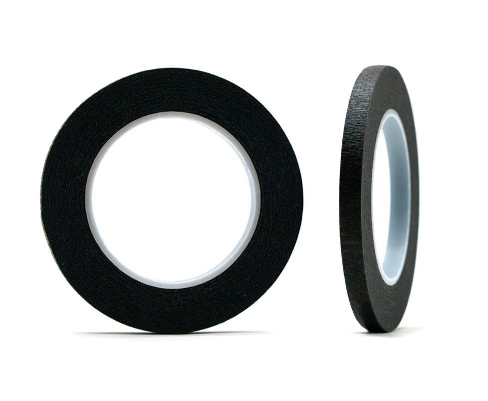 Two rolls of black tape on a white background
