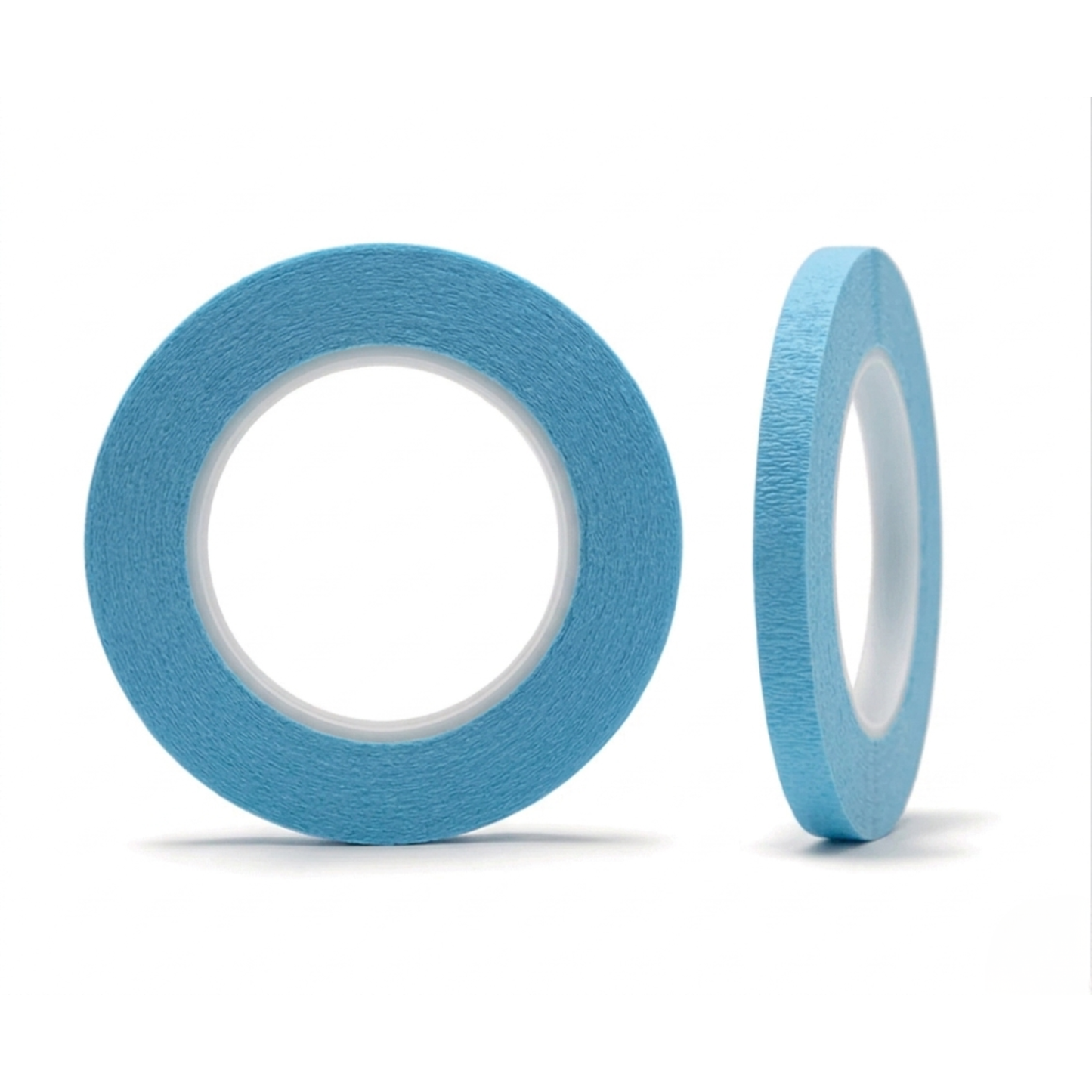 Two rolls of blue tape on a white background