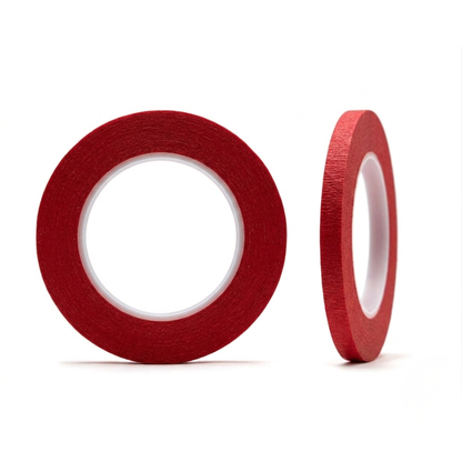 Two rolls of red tape on a white background