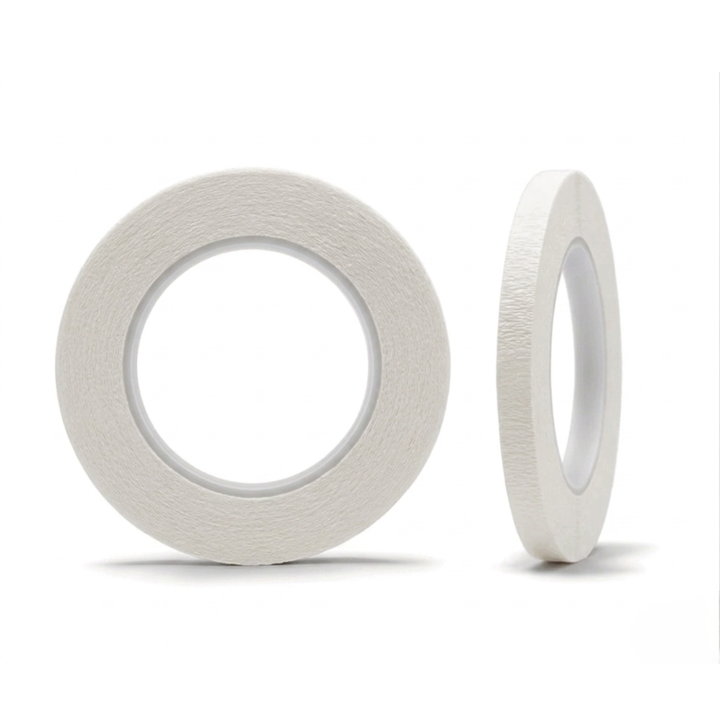 Two rolls of white tape on a white background