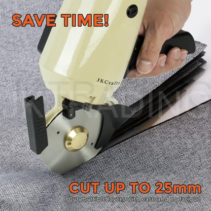 Hand guiding the powerful commercial electric rotary cutter smoothly through thick grey carpeting up to 25mm deep.