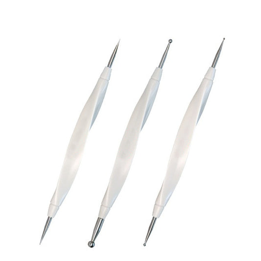 Three white double-sided scoring stylus pens for paper crafting angled on a white backdrop.