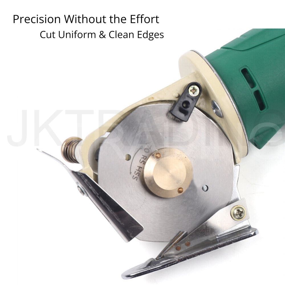 Close-up profile of the sharp octagonal steel blade and protective guard shoe on the electric fabric slicer.
