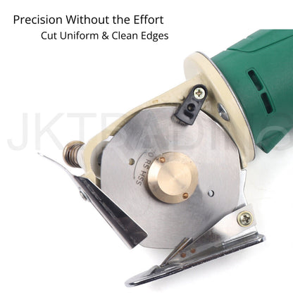 Close-up profile of the sharp octagonal steel blade and protective guard shoe on the electric fabric slicer.