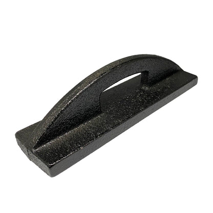 Heavy-duty black cast iron fabric pattern weight with an integrated handle isolated on a white background.