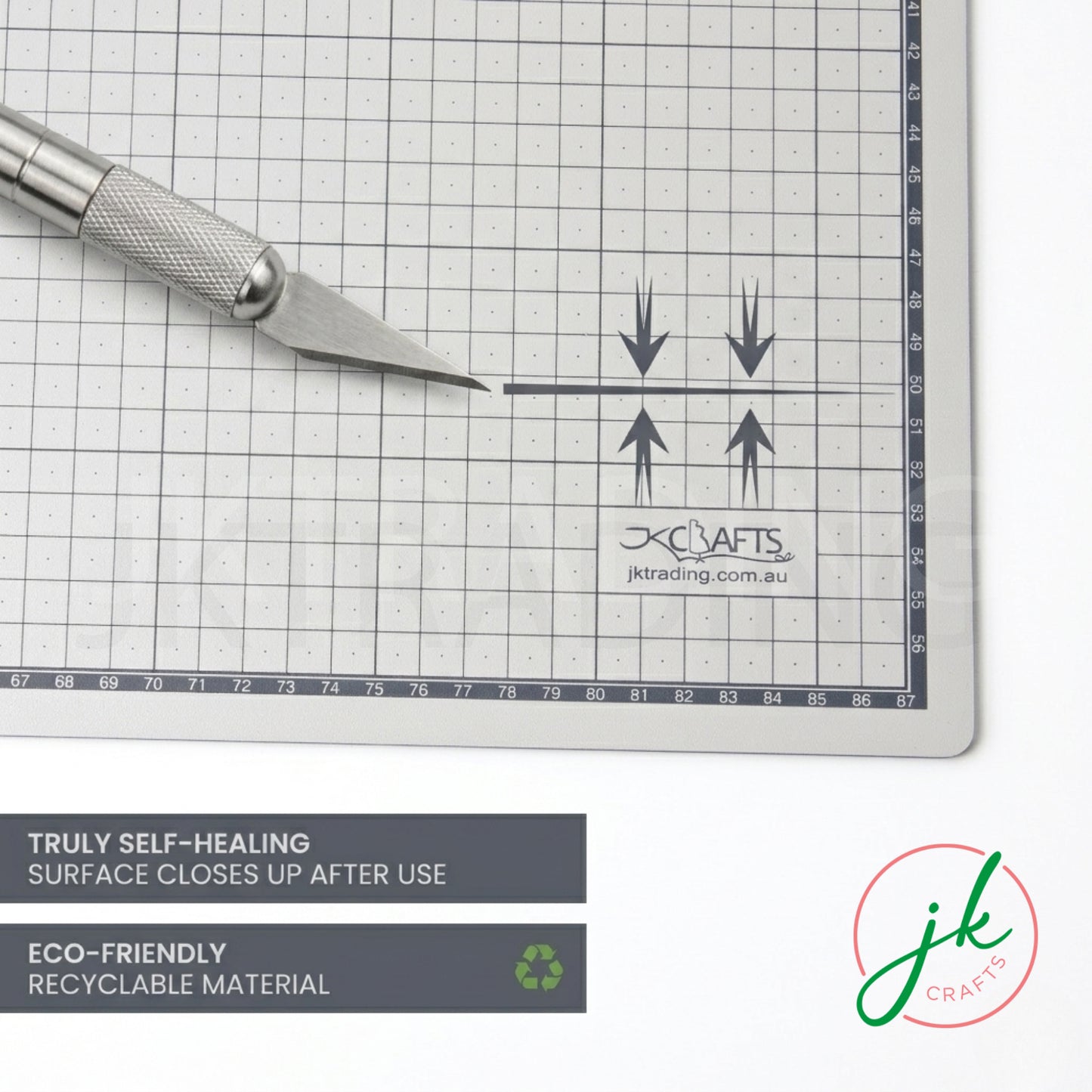 Close-up macro demonstration of a hobby scalpel blade cutting precisely along the wavy seam edge.
