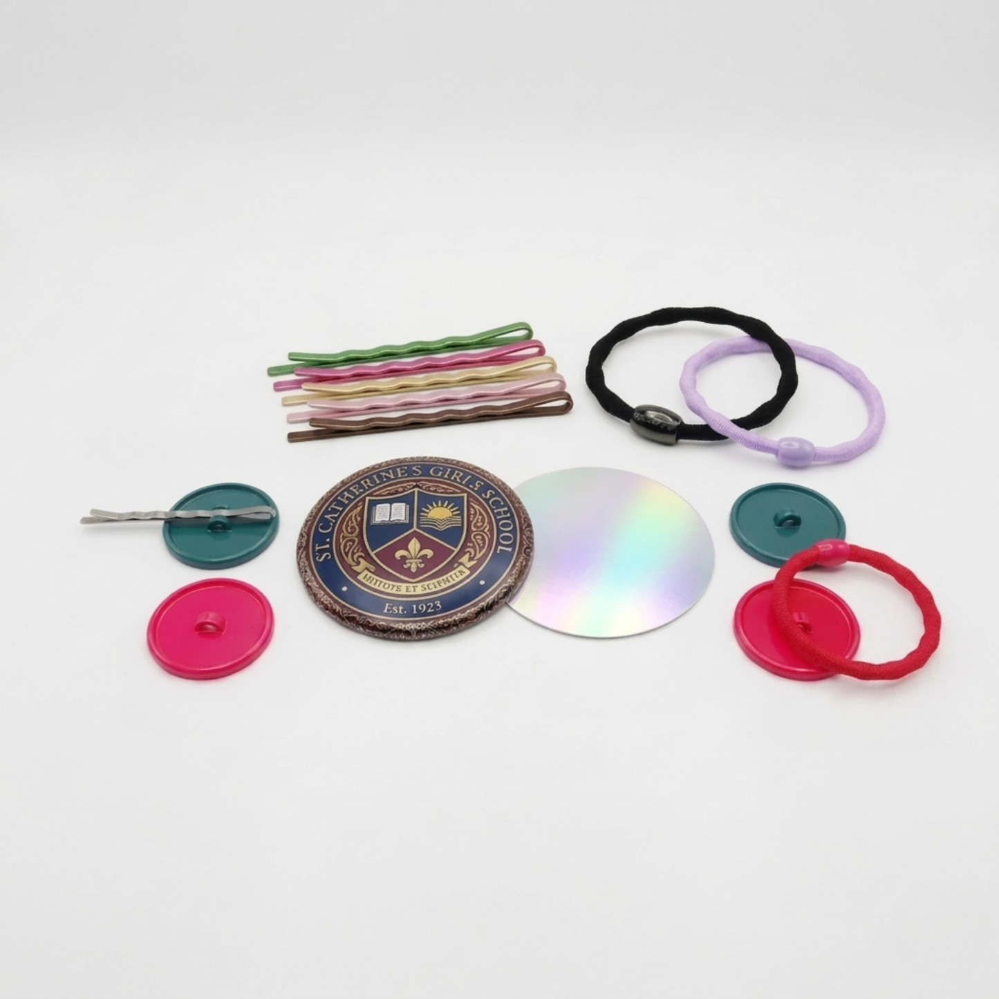 DIY Button Badge Collection of hair accessories including hair ties, clips.