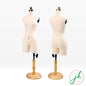Front and three-quarter view comparison of two half scale female trousers dress forms on wooden bases.