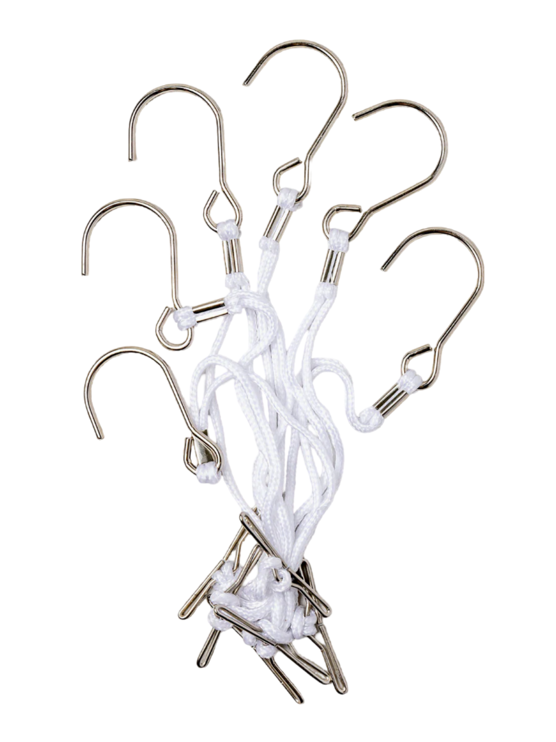 Cluster of professional metal t-bar hanging pattern hooks with white nylon cords for studio organization.