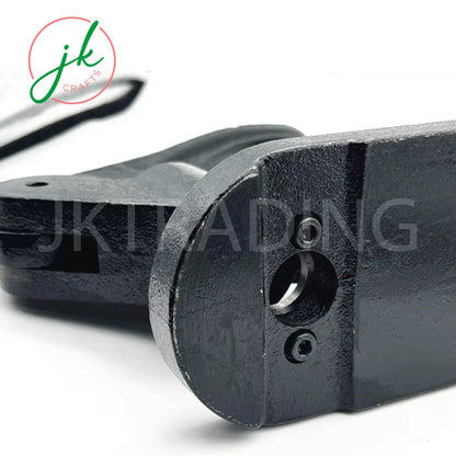Close-up of a metal component with 'JK Trading' branding on a white background