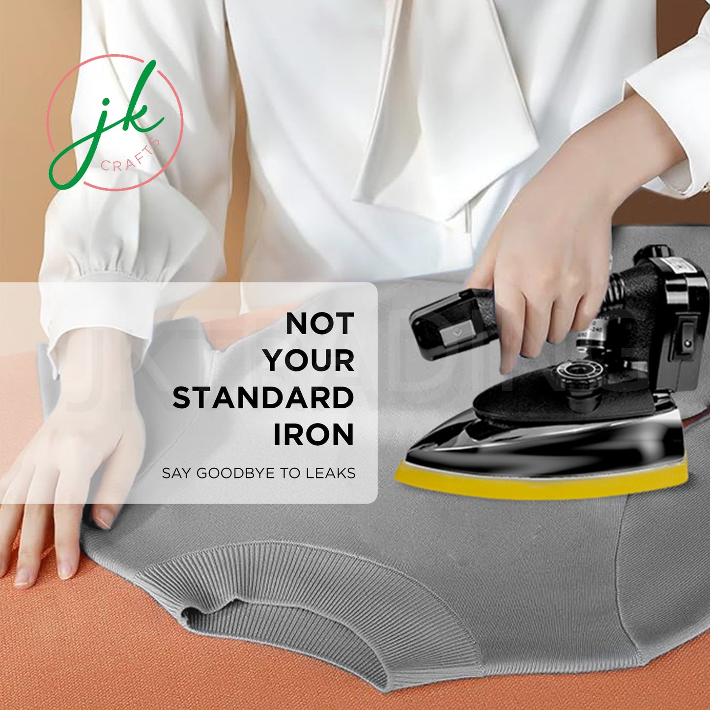 Tailor pressing seams on a fabric garment piece using a premium heavy-duty gravity feed steam iron.