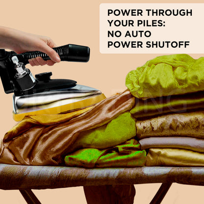 Action shot of a commercial gravity iron pressing a thick stack of folded clothing without auto shut-off disruption.