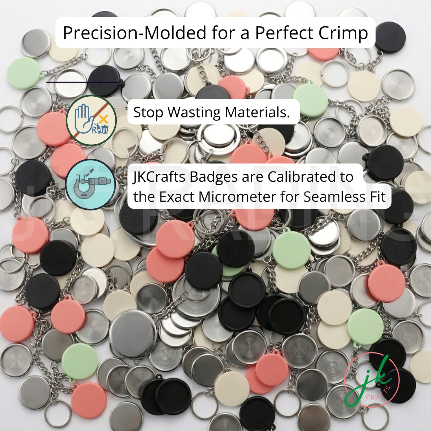 Bulk heap of blank metal back shells and colored plastic keychain backings for button badge press assembly.