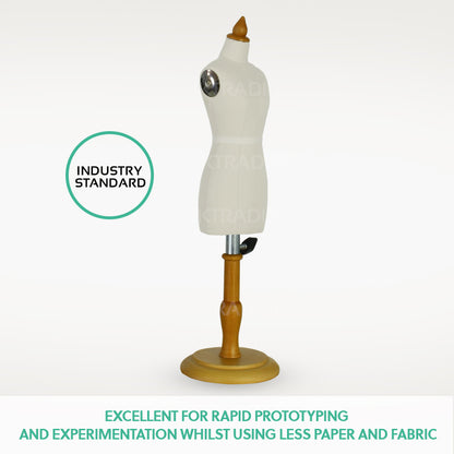 Three-quarter profile view of the miniature female trousers dress form with premium linen fabric on a wood stand.
