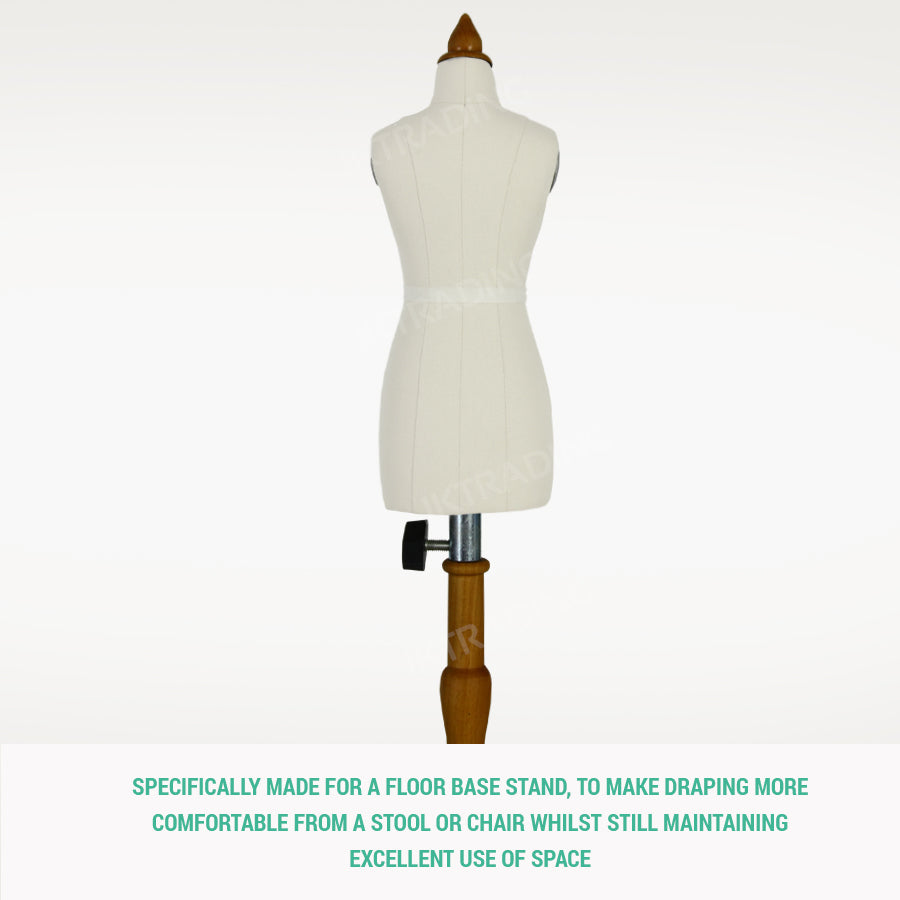 Mannequin torso on a wooden base with text on a white background