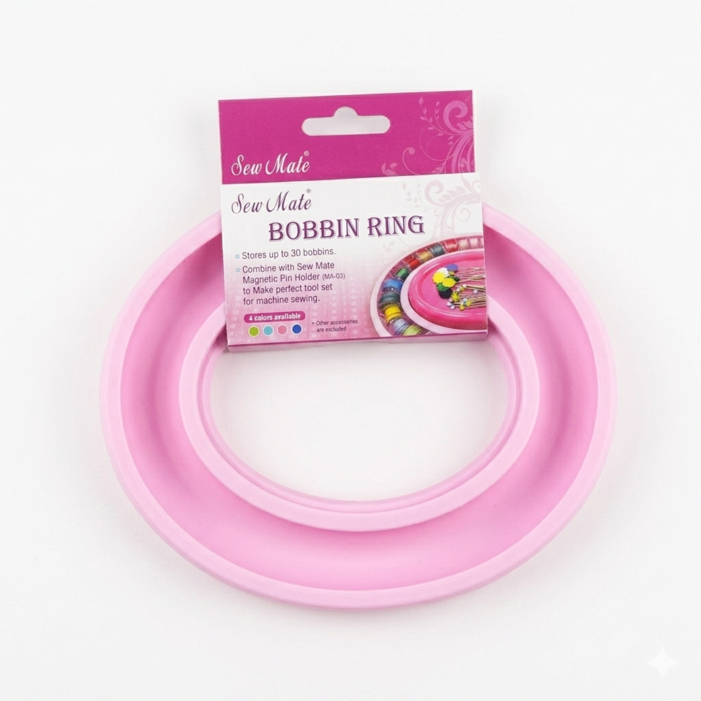 Pink bobbin rings with packaging on a white background