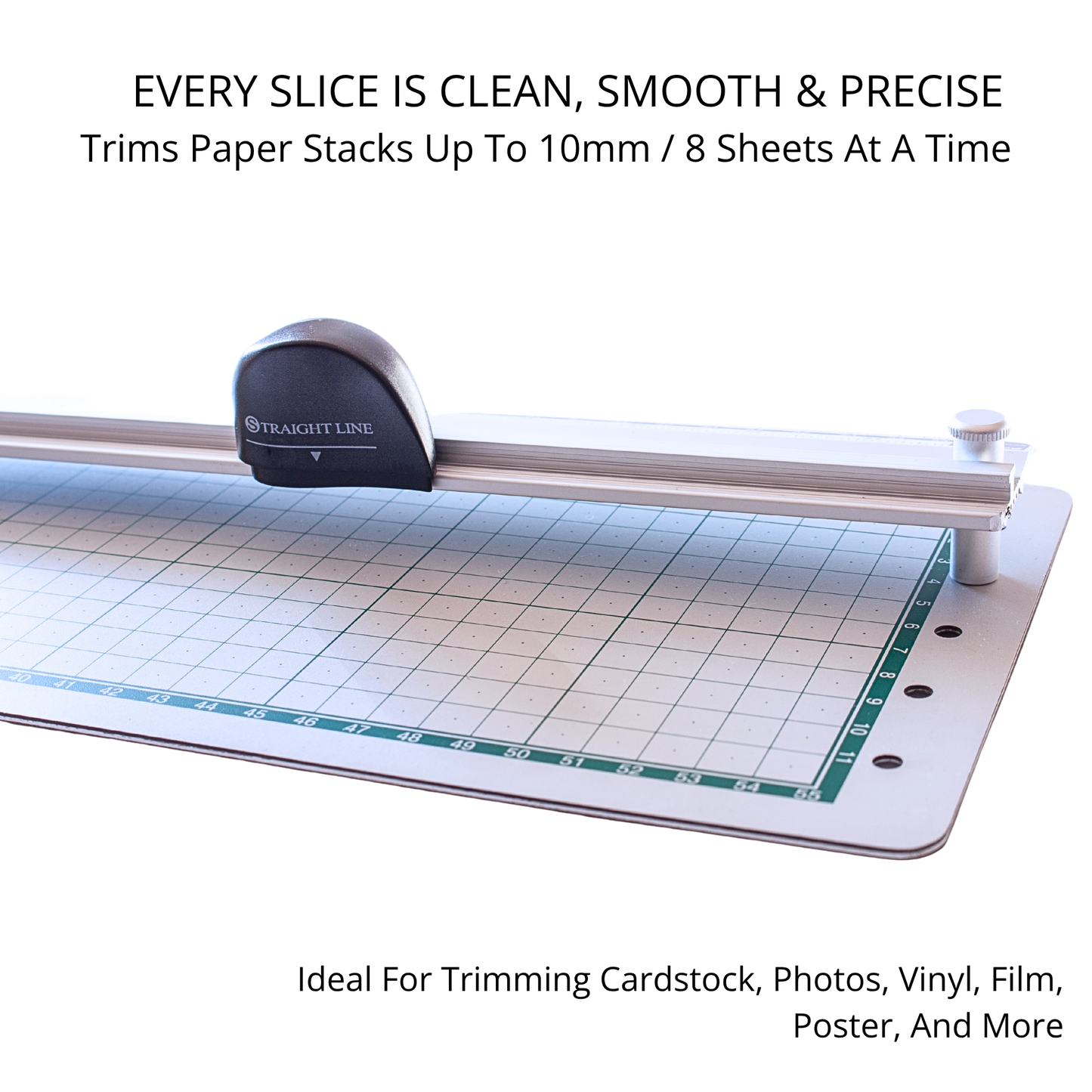 Precision sliding blade assembly moving smoothly across a gridded crafting alignment mat board.