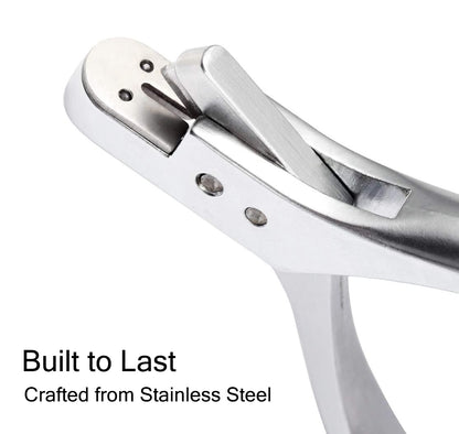 Close-up of the heavy-duty stainless steel cutting blade jaw mechanism built for crisp pattern making cuts.