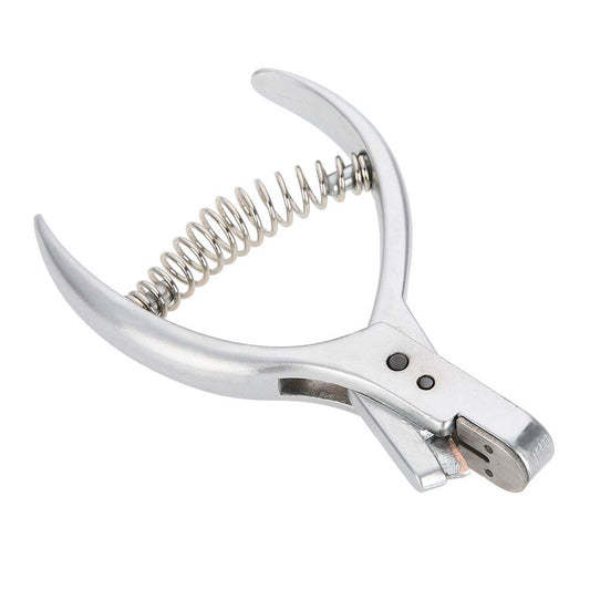 Angled profile view of the premium metallic dressmaking pattern hole punch tool highlighting the internal spring.