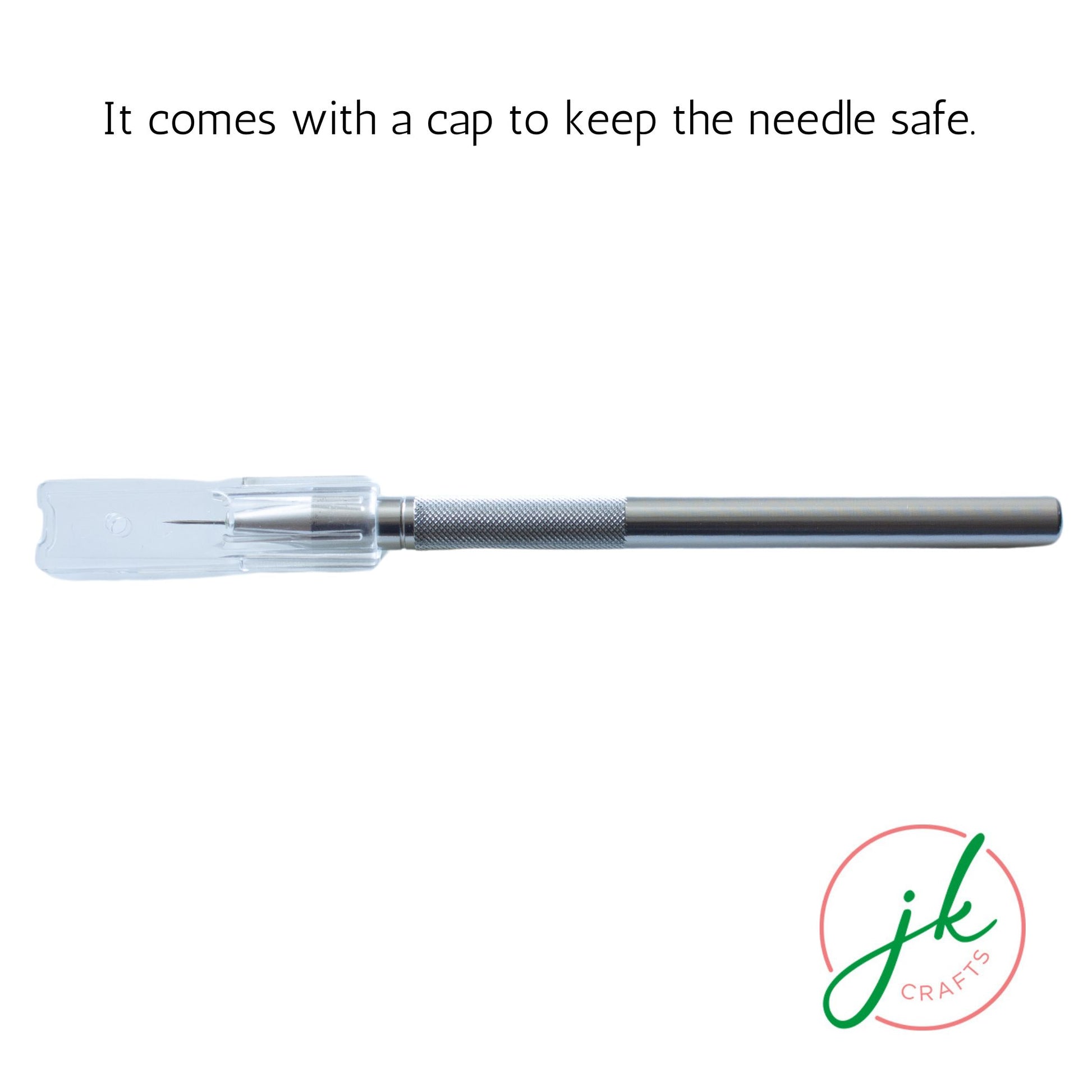 Horizontal view of the sleek metal pricking pen resting inside its transparent protective safety sleeve.