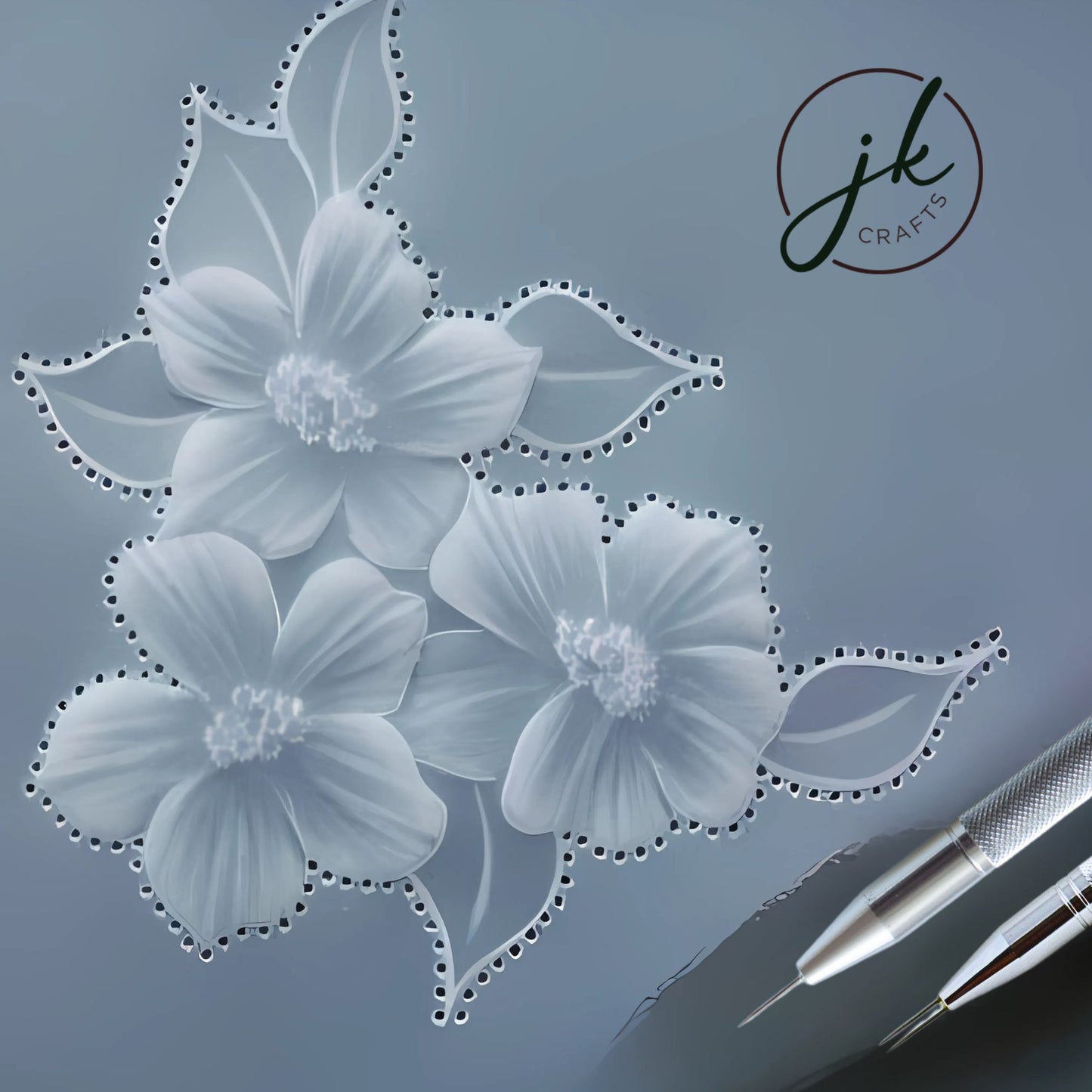 Intricate translucent white embossed floral layout showcasing fine lace filigree patterns made with a parchment pricking tool.