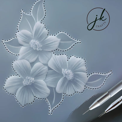 Intricate translucent white embossed floral layout showcasing fine lace filigree patterns made with a parchment pricking tool.