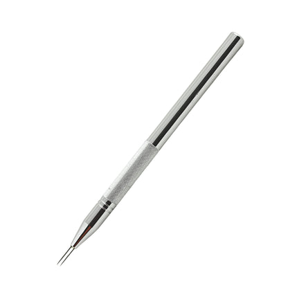 Close-up profile view of the sharp dual-needle steel tip engineered for fine pergamano stenciling work.