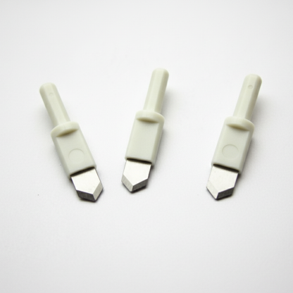 Three ultra-sharp replacement blades with white plastic safety shafts for a round circle compass paper cutter.