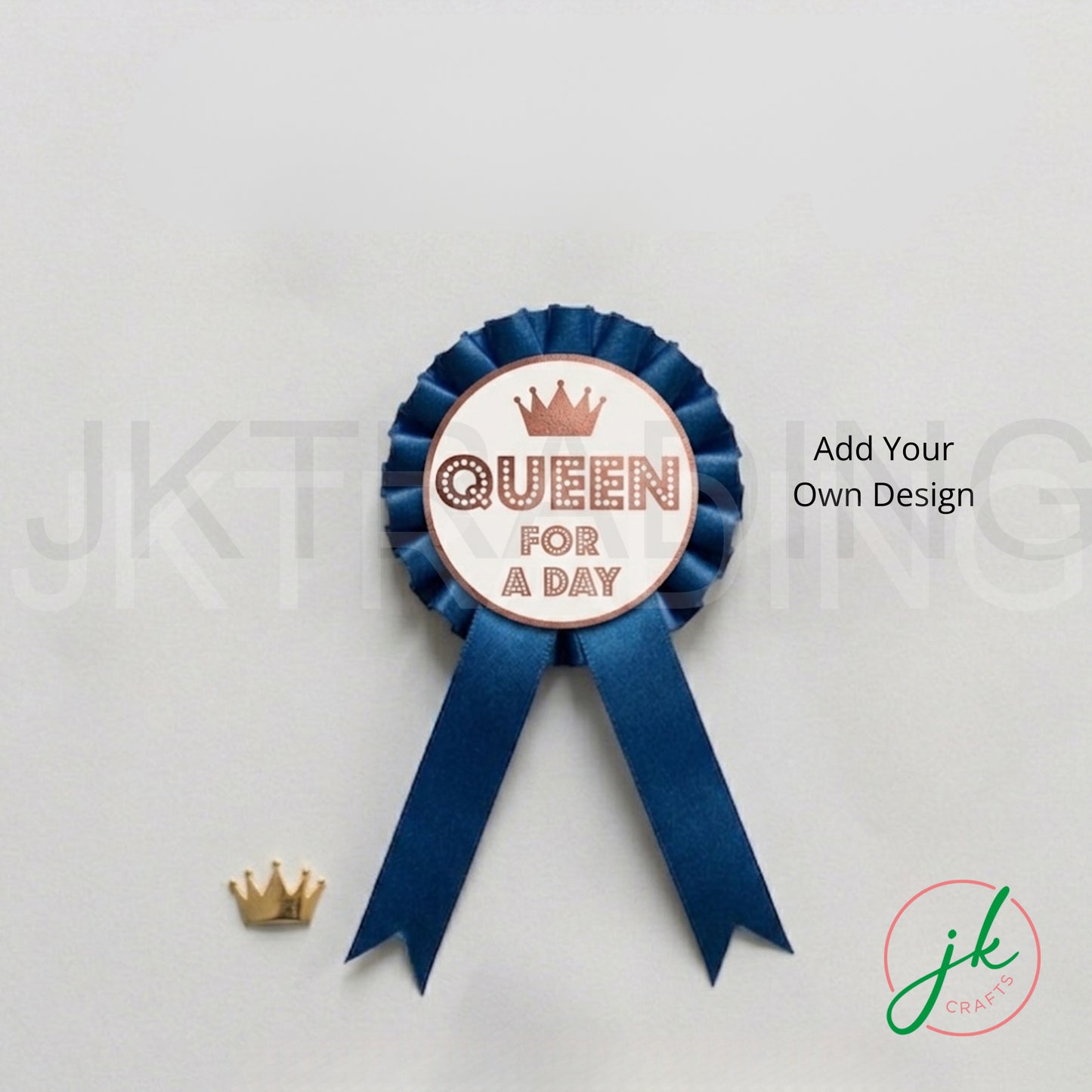 Decorative badge ribbon with 'Queen for a Day' text on a light gray background