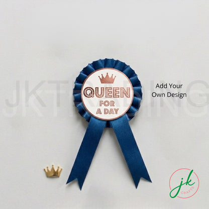 Decorative badge ribbon with 'Queen for a Day' text on a light gray background