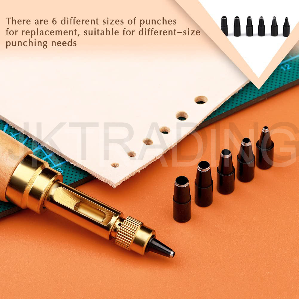 Punch tool with interchangeable punches on an orange background