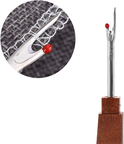 Close-up macro diagram illustrating the safety ball point cutting mechanism slicing safely through woven fabric threads.
