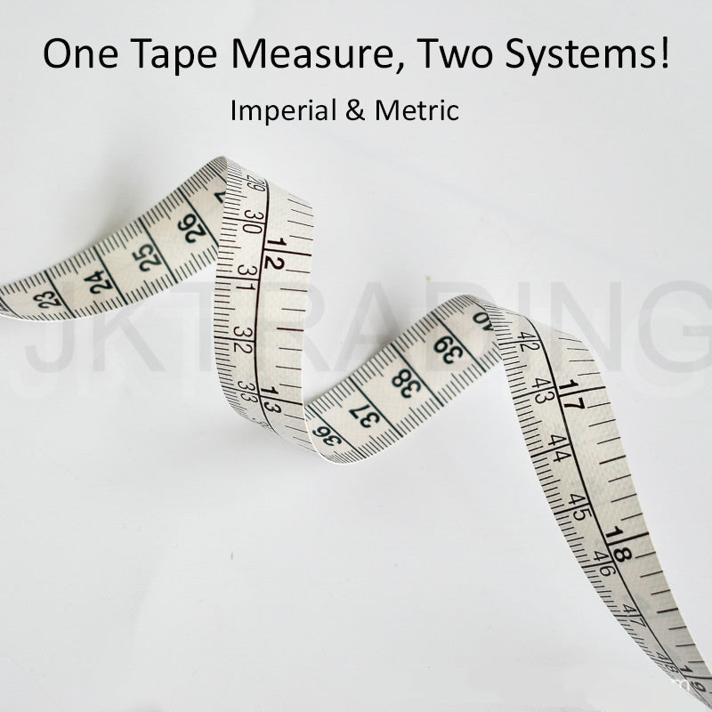 Close-up of an extra-long white flexible cloth tailors measuring ruler curving across a white background.