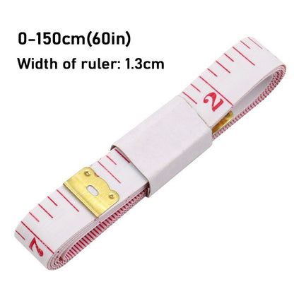 Roll of measuring tape with white casing and red measurement markings on a white background.