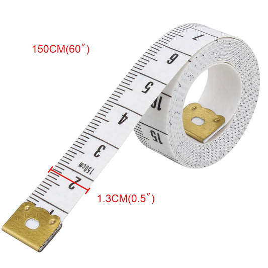 Measuring tape with white surface and gold ends on a white background
