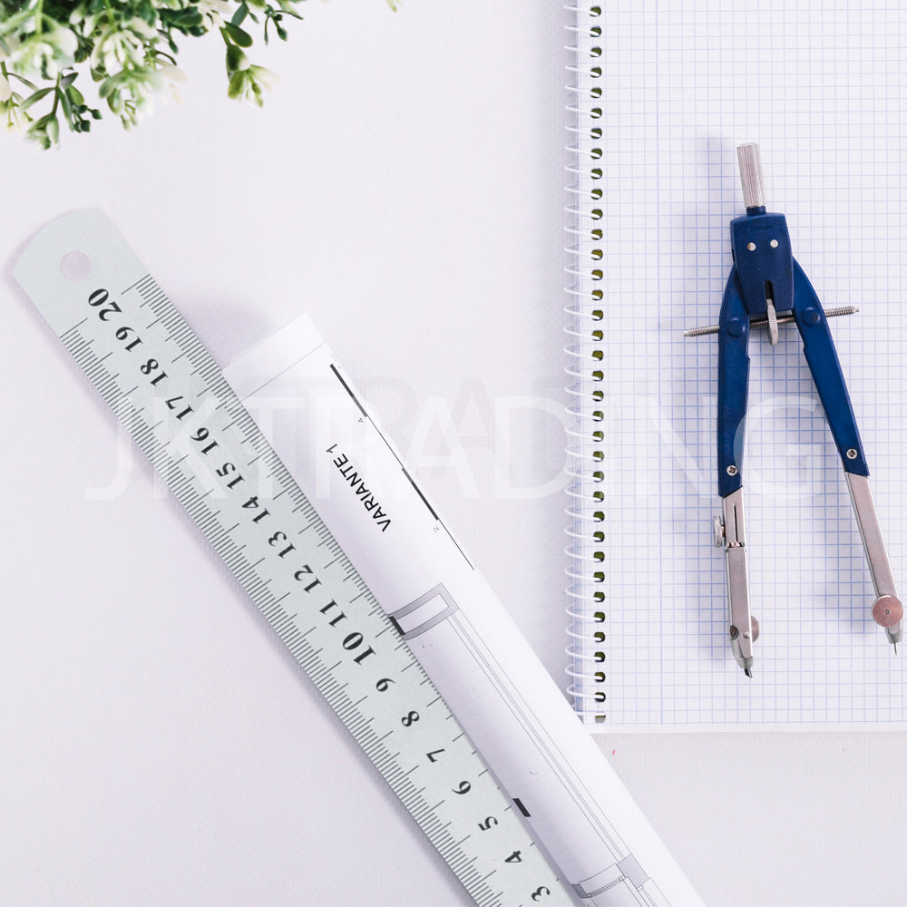 Precision metal straight edge ruler lying horizontally next to a classic geometry drafting bow compass.