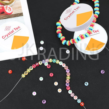 Colorful beaded necklaces with letter beads on a black surface, featuring 'Crystal Tec' packaging.