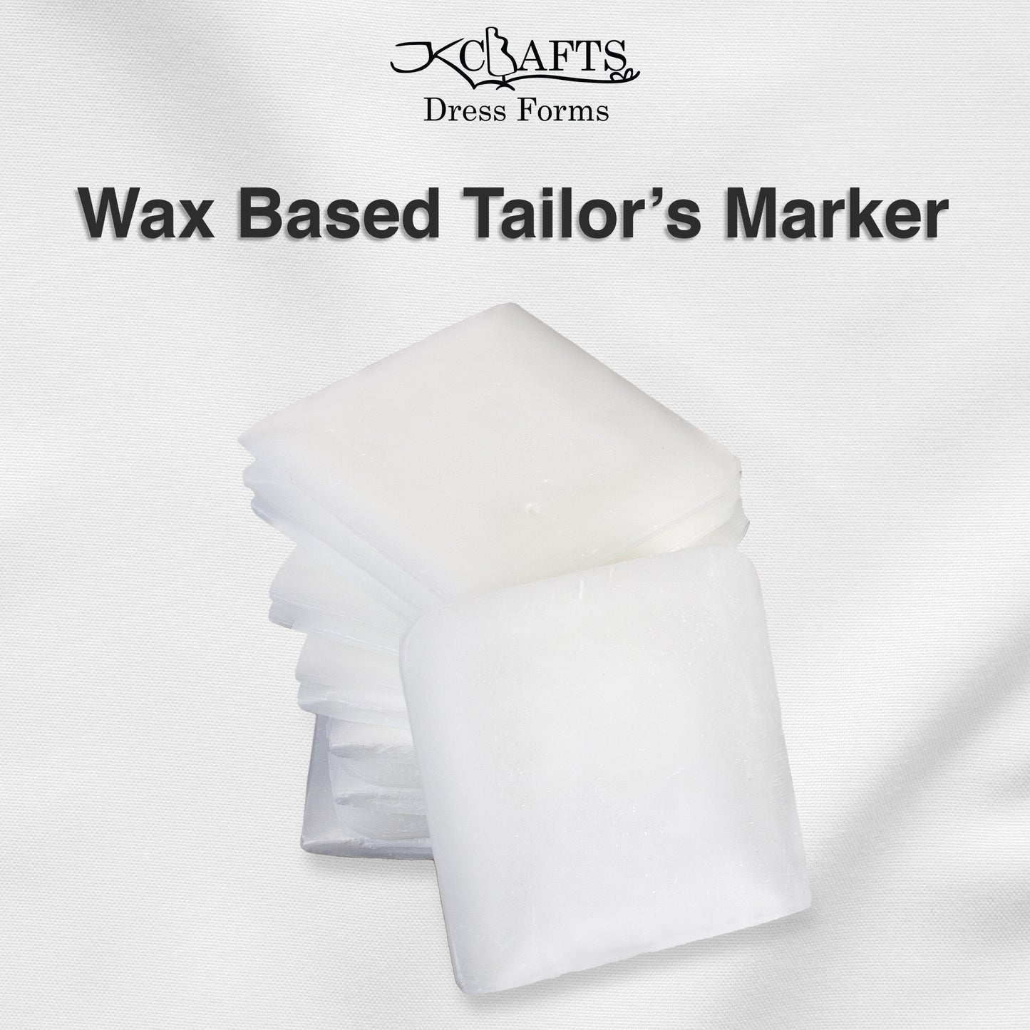 White wax-based tailors marker blocks stacked neatly next to their retail packaging box.