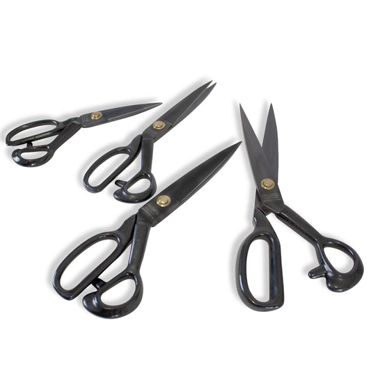 Four pairs of black-handled scissors on a white background