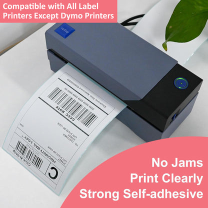 Desktop direct thermal label printer feeding out a freshly printed crisp barcode shipping address label.