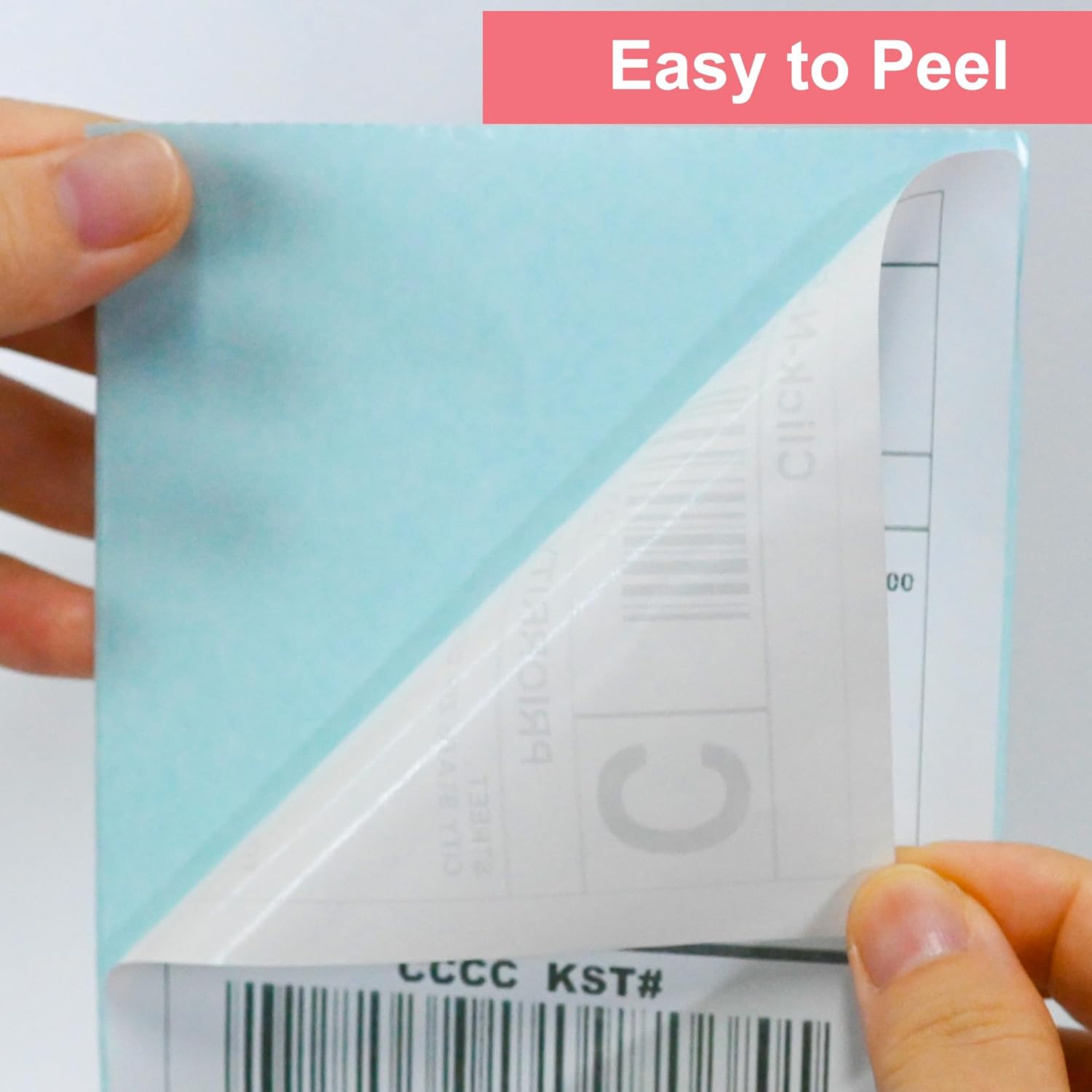 Close-up showing how easily the self-adhesive waterproof shipping sticker peels away from its blue backing sheet.