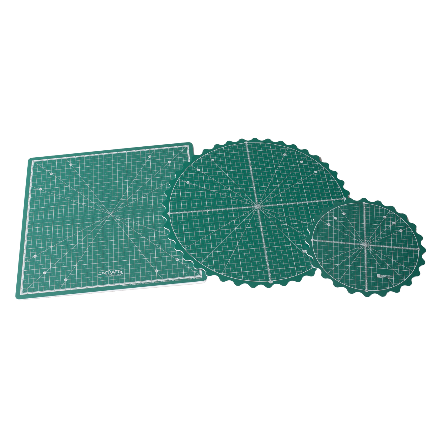 Collection of Green Round and Square Rotating Cutting Mats for Crafting